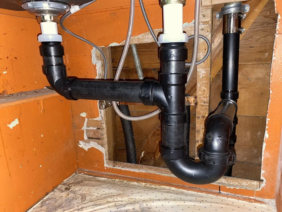 Professional Garbage Disposal Repair equipment and tools on the job in Hilliard